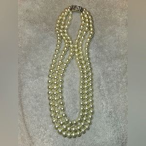 TRIPLE STRAND CULTURED PEARLS WITH SIMULATED DIAMOND SILVER PLATED CLASP. WOW.